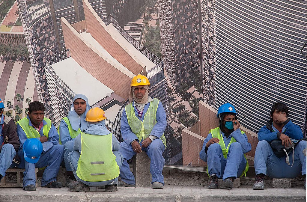 1024px Migrant workers in West Bay Doha