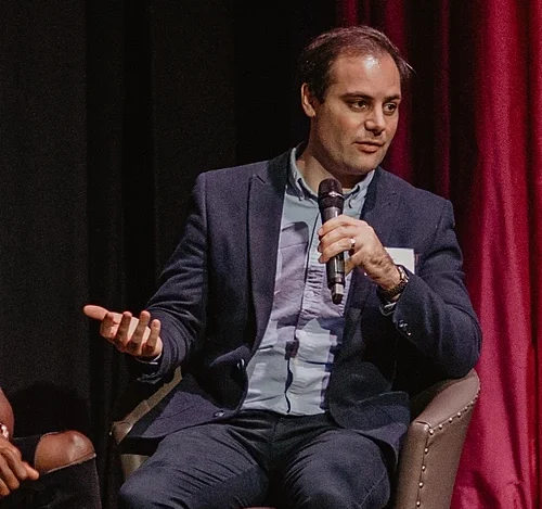 Ben Delo on stage at The Spectators Whos afraid of Bitcoin conference.jpg e1789302583235